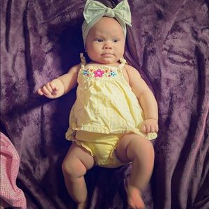 Yellow flower onesie